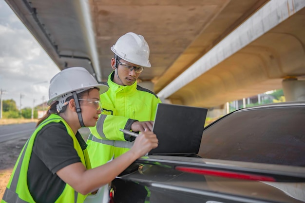two engineers discuss about work site large bridge constructionmanagement consulting people discussion with engineers about progress construction planning highway 44277 25190